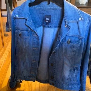 Bedazzled jean jacket stone washed like new.